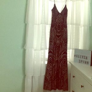 Long, fitted, rose gold and black prom dress